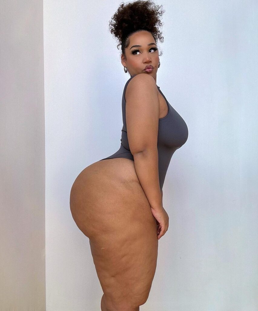 Curvy model strips to lingerie – but fans hit back at trolls for 'fat shaming'