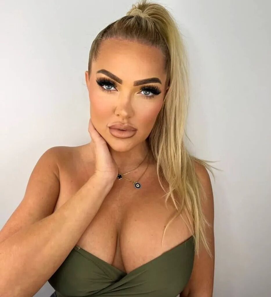 Aisleyne Horgan-Wallace Flaunts Tan in Plunging Swimsuit