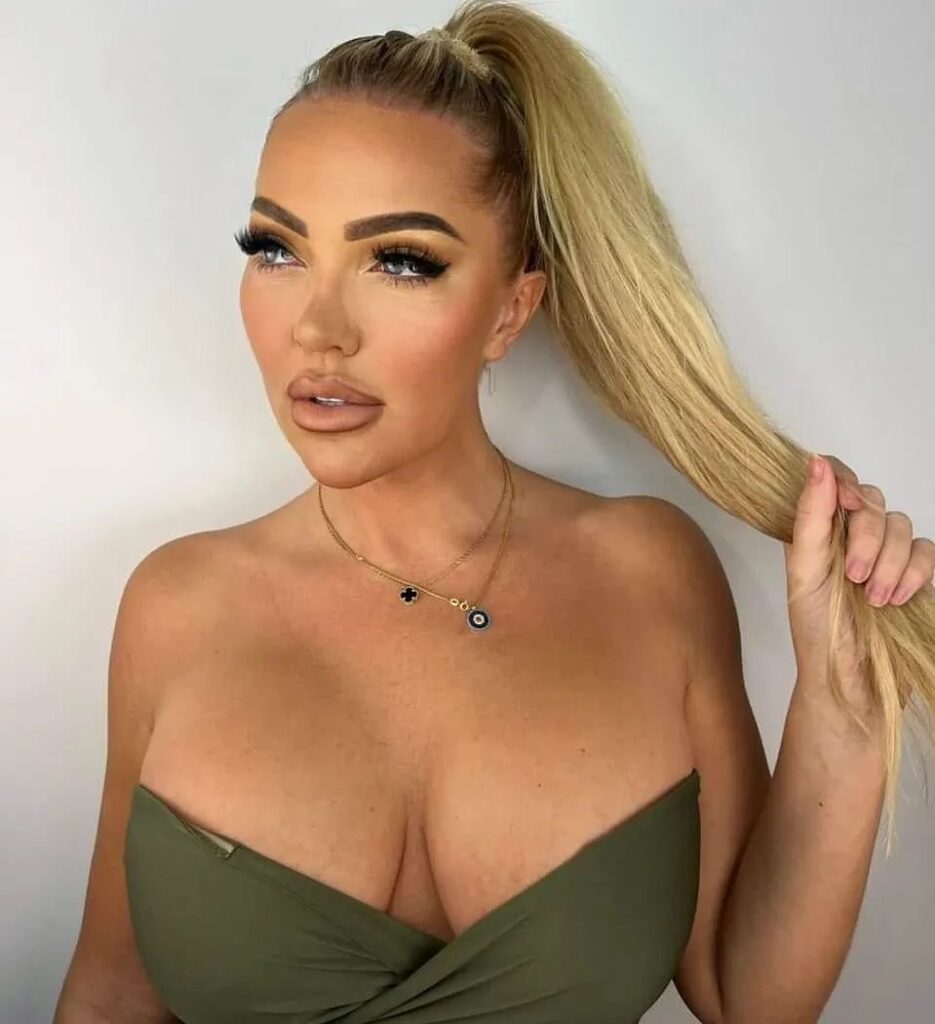 Aisleyne Horgan-Wallace Flaunts Tan in Plunging Swimsuit