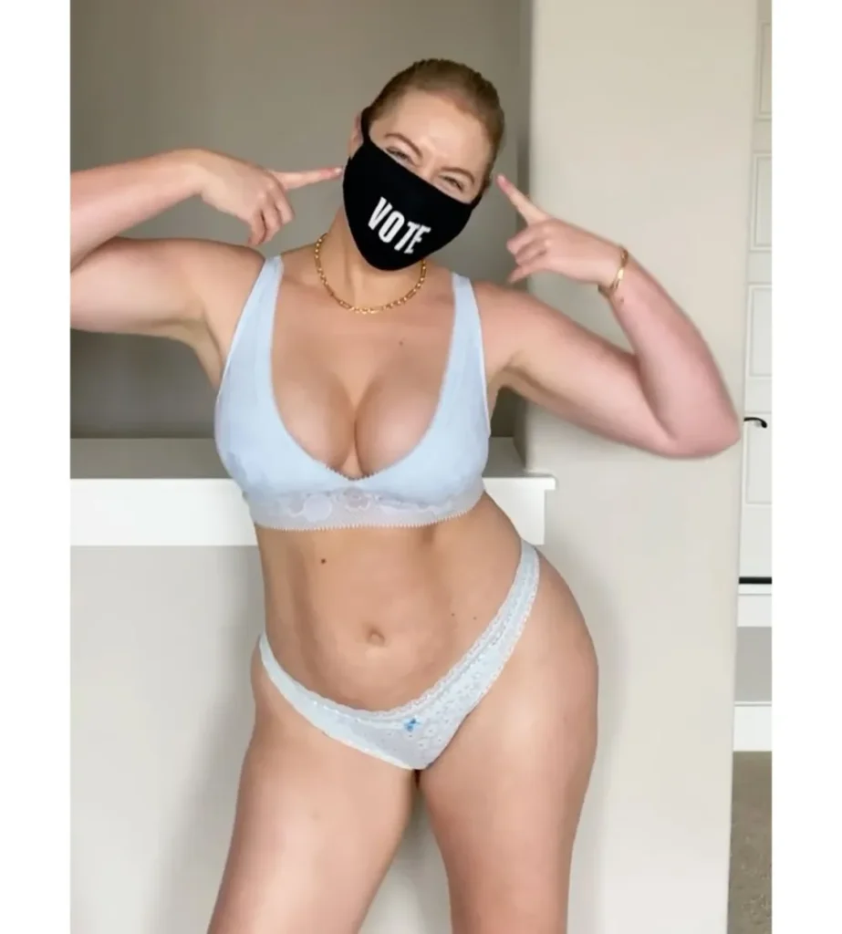 Model and Body Image Advocate Iskra Lawrence Shows Abs and Curves With a Positive Message in a Teeny Red Bikini