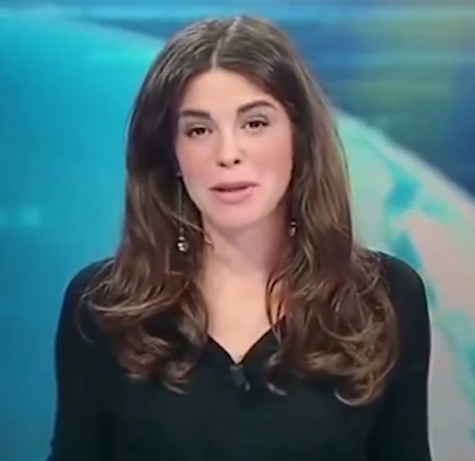 (VIDEO) News Anchor Gives Viewers An Eyeful On Live Tv After Forgetting She’s Sitting At A Glass Desk