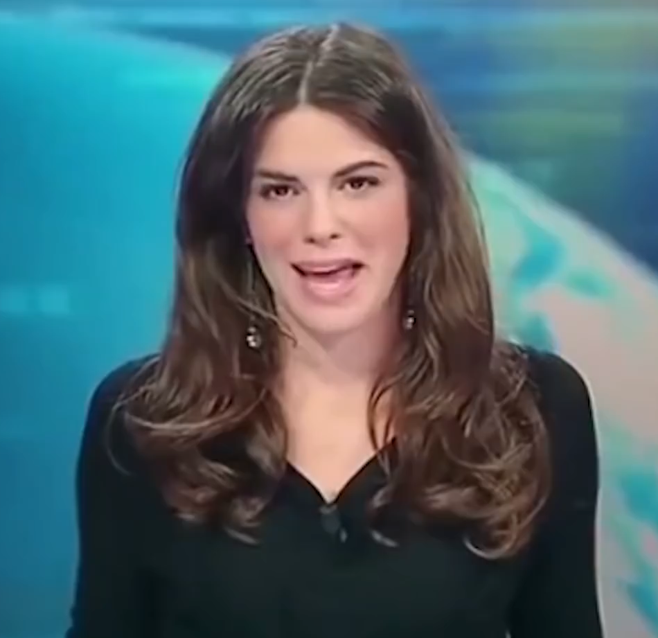 (VIDEO) News Anchor Gives Viewers An Eyeful On Live Tv After Forgetting She’s Sitting At A Glass Desk